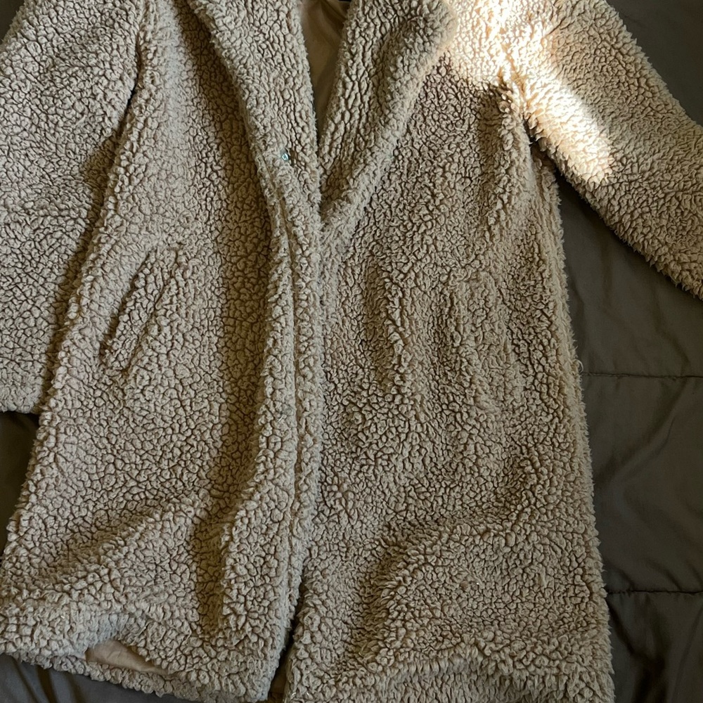 A faux fur coat great for the winter time M but can fit S-L